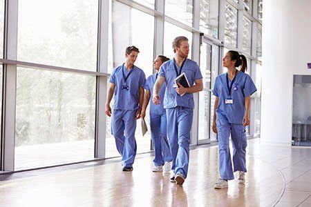 Nurses Walking At The Lobby — Los Angeles, CA — Spiga and Associates