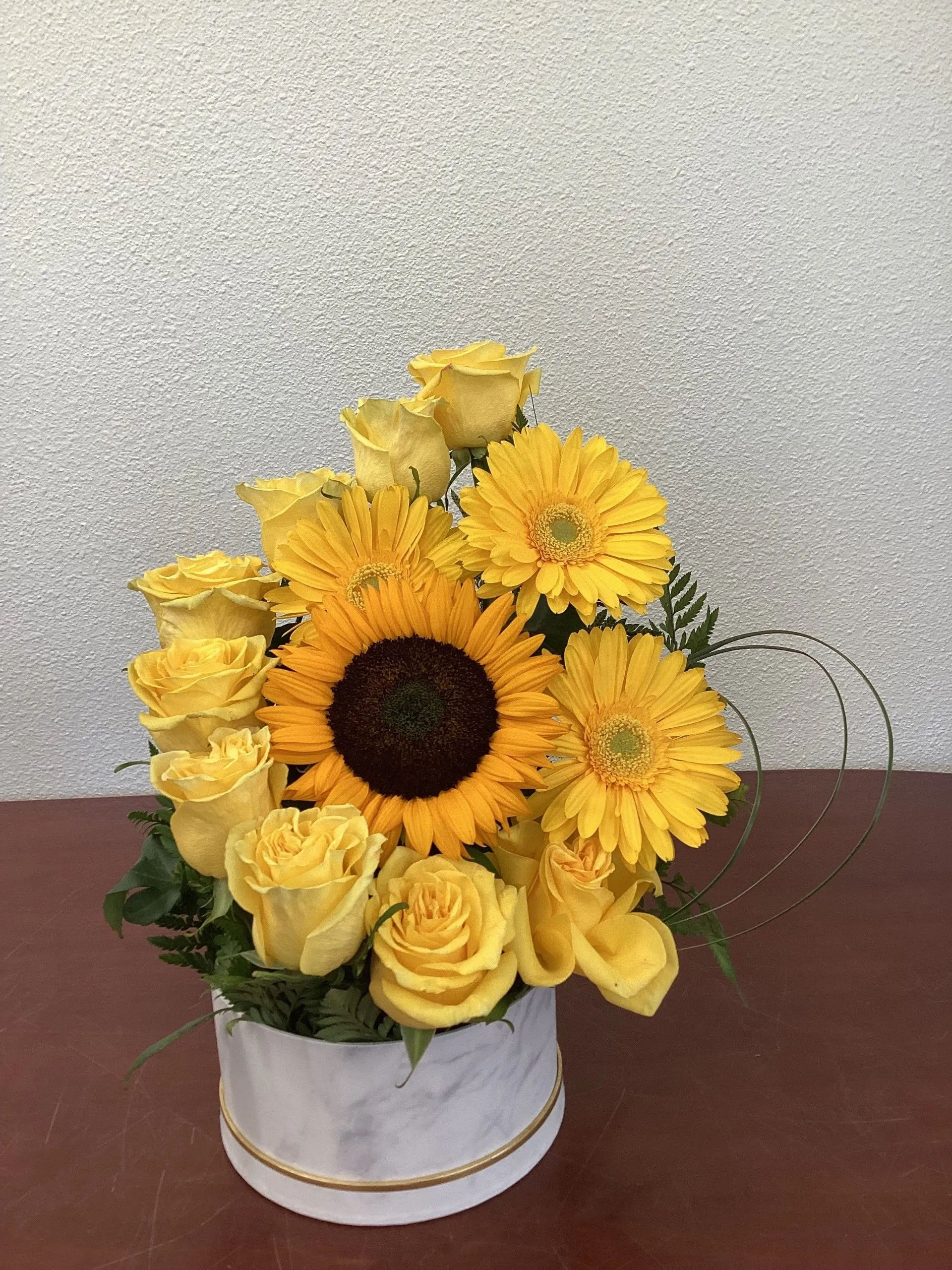 Yellow flowers and a sunflower
