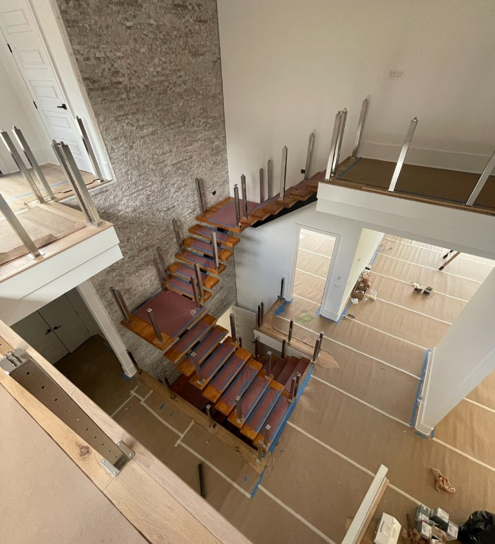 An aerial view of a staircase in a house under construction