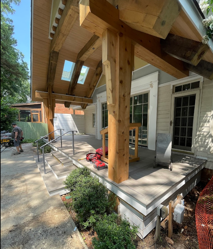 A house with a wooden porch and stairs