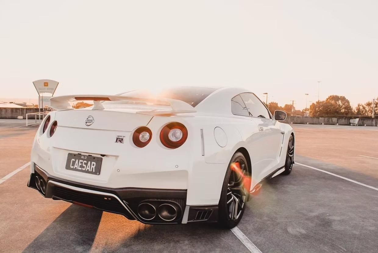 A White Sports Car is Parked in a Parking Lot — Step Up Automotive in Southport, QLD