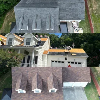 An aerial view of a house with a new roof being installed.