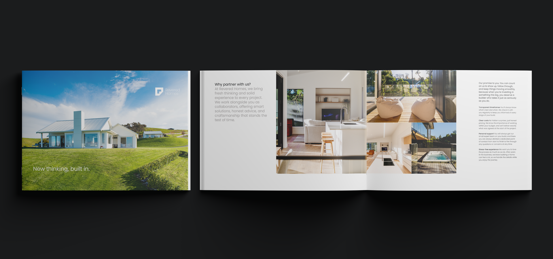 Open book with house and interior photos on dark background.