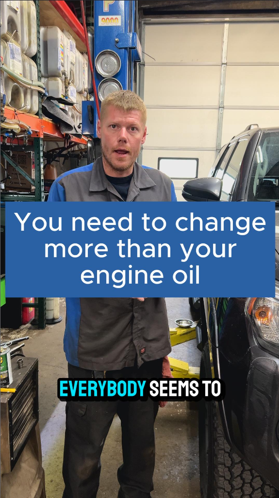 Mechanic in a shop, points to text saying “You need to change more than your engine oil.” The setting is a garage.