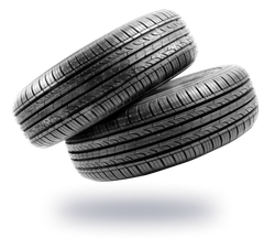 Two black car tires stacked | King's Auto Center