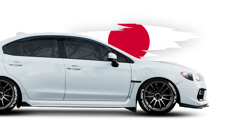 White Subaru sedan with Japanese flag background. | King's Auto Center