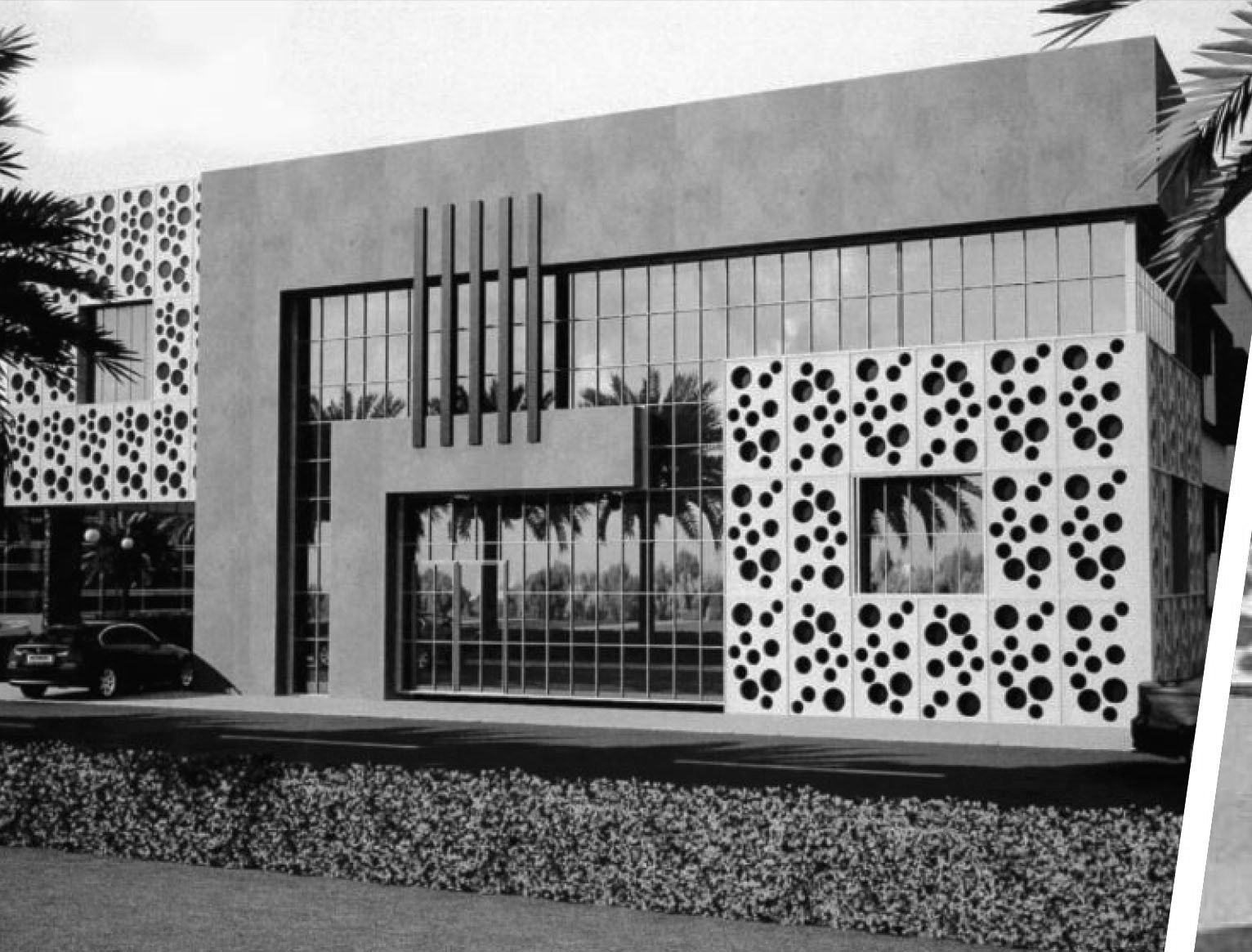 Modern building with glass facade and patterned side walls. A black car is parked in front.