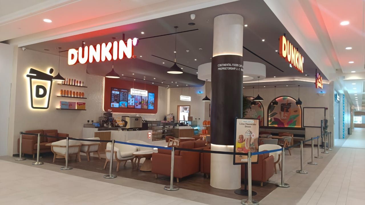 A dunkin ' donuts restaurant in a mall
