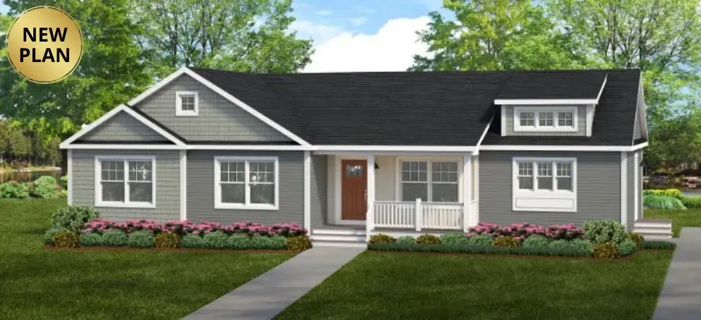 A gray and white suburban house with a brown front door and a manicured lawn. 