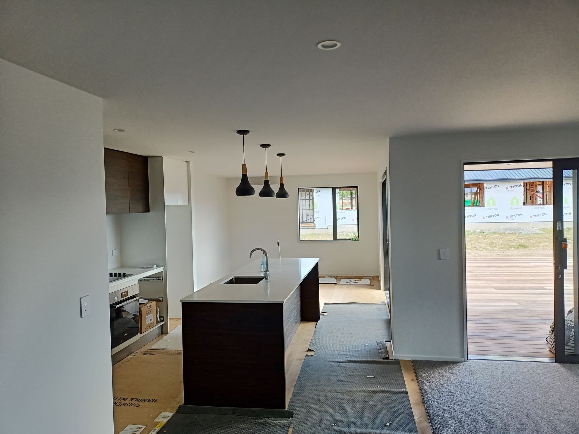 A kitchen with a large island in the middle of the room.