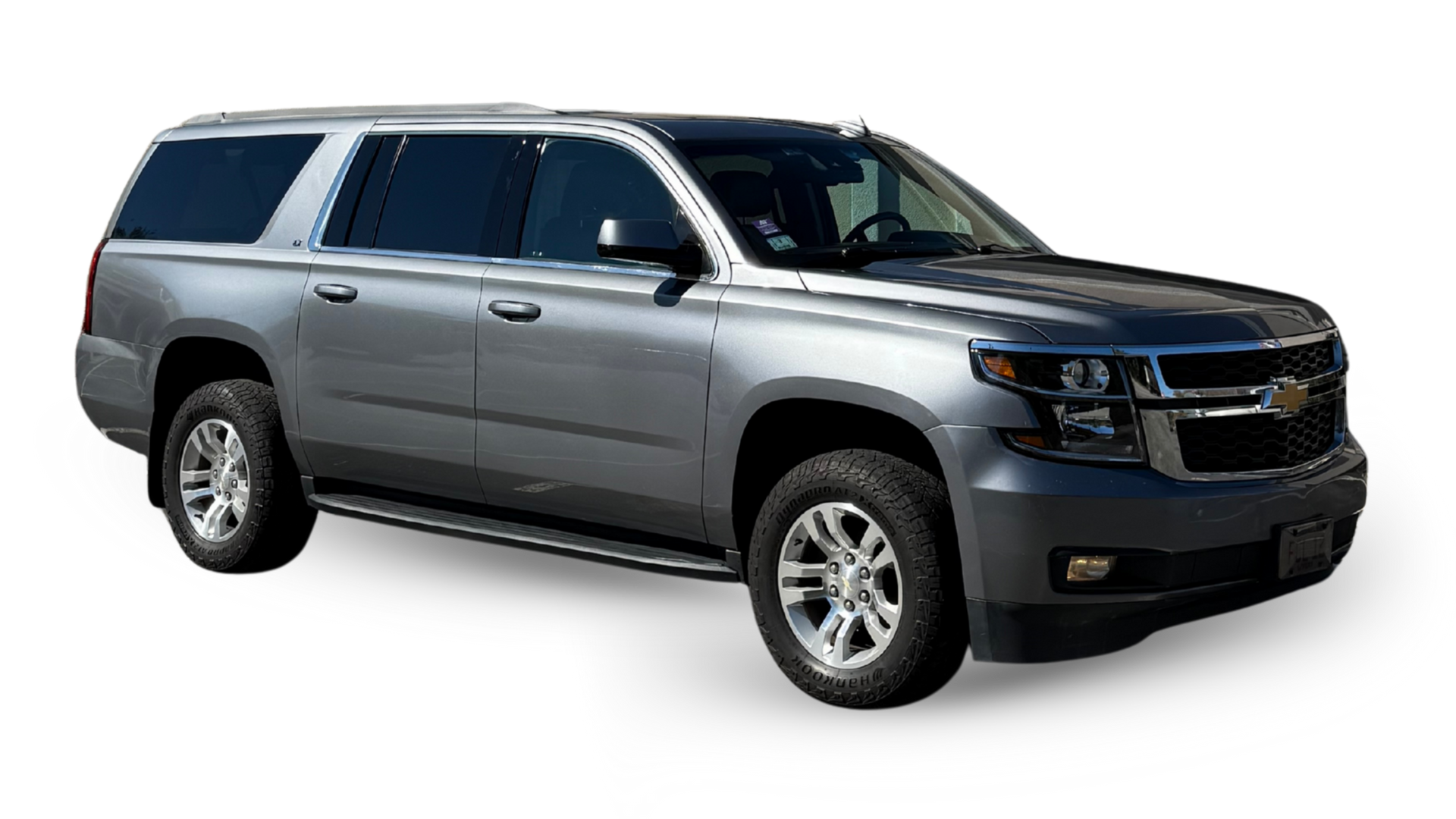 Gray Chevrolet Suburban SUV.