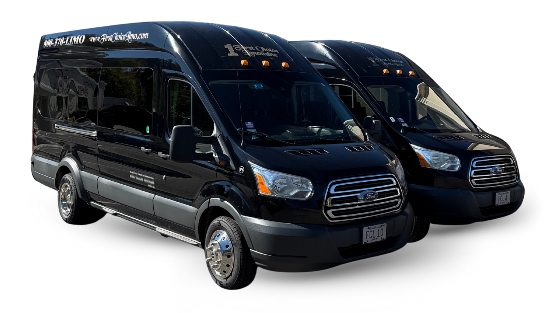Two black passenger vans, parked together.