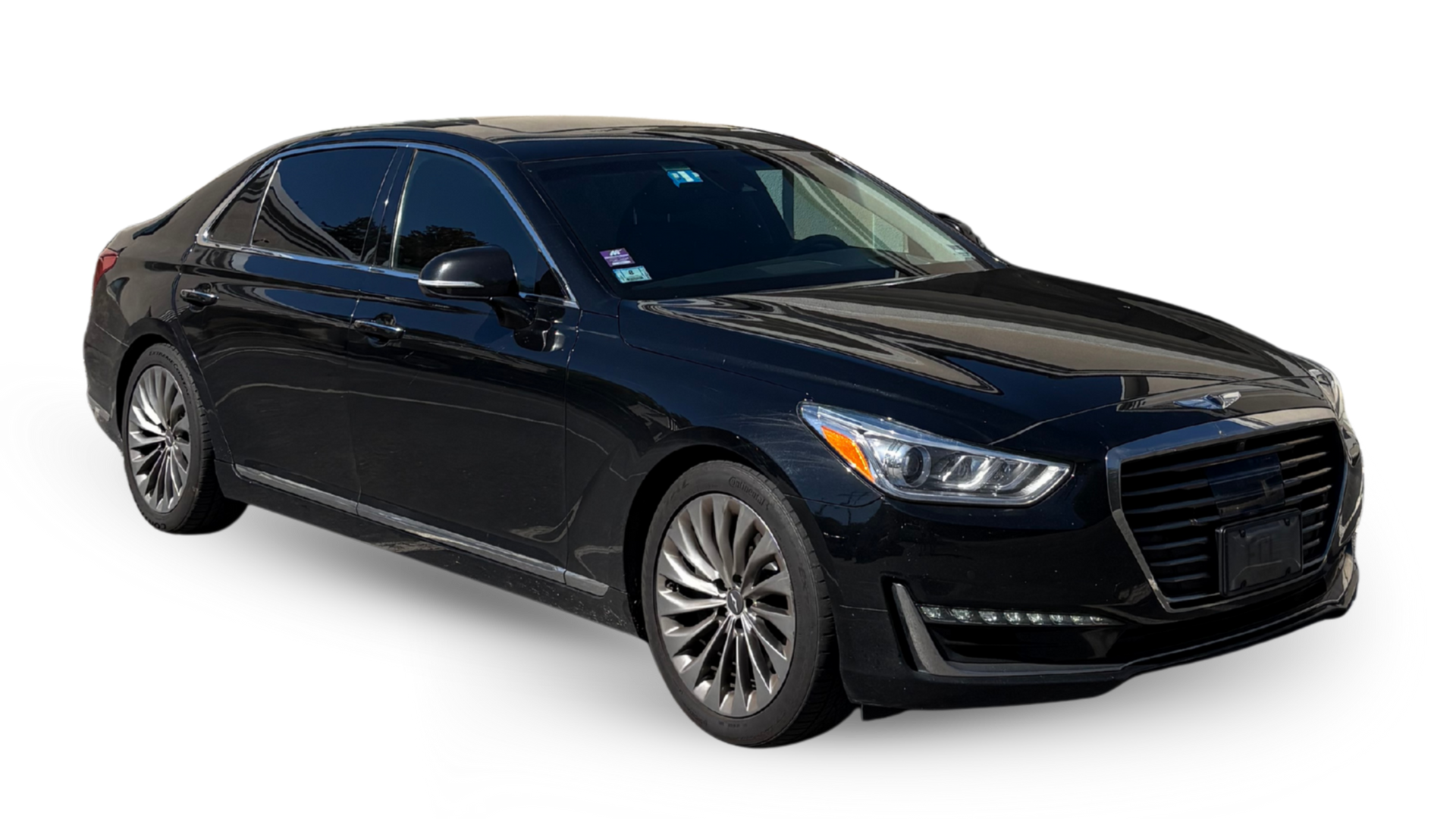 Black Genesis G80 sedan parked at an angle.