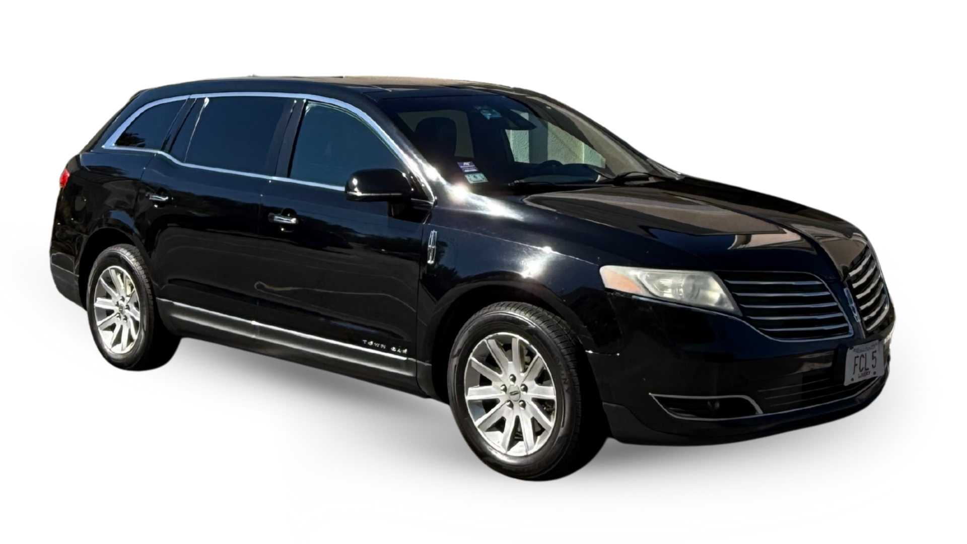 Black Lincoln MKT SUV on a white background, angled right.