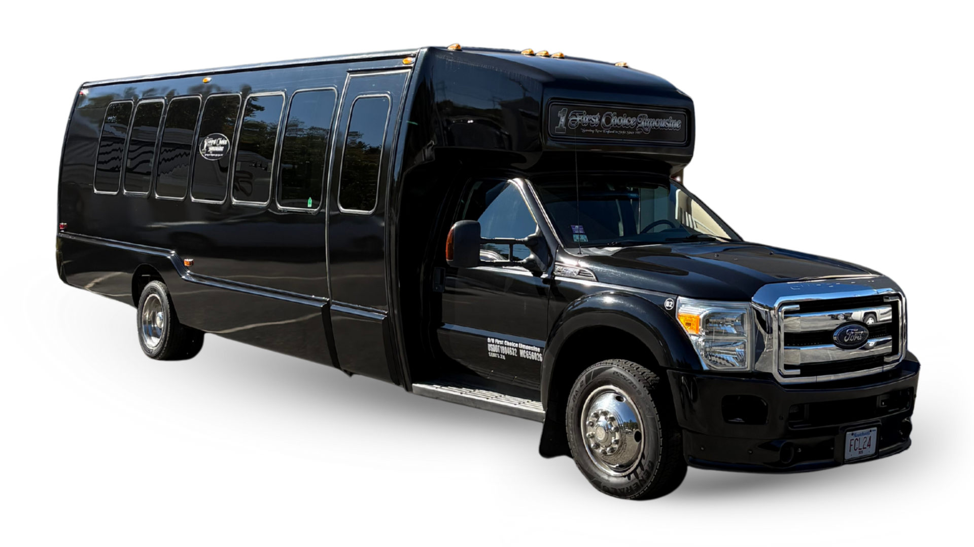 A long, silver Hummer limousine parked outdoors.