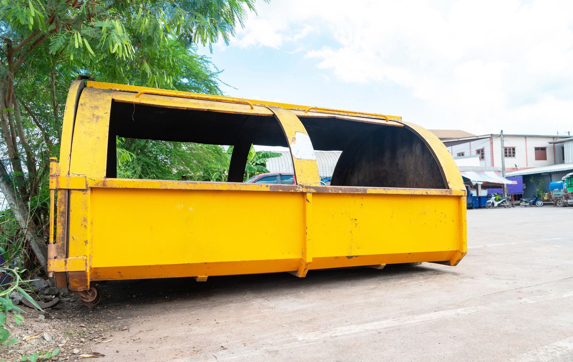 Yellow tub truck as a temporary garbage dump. Yellow tub truck as a temporary garbage dump.