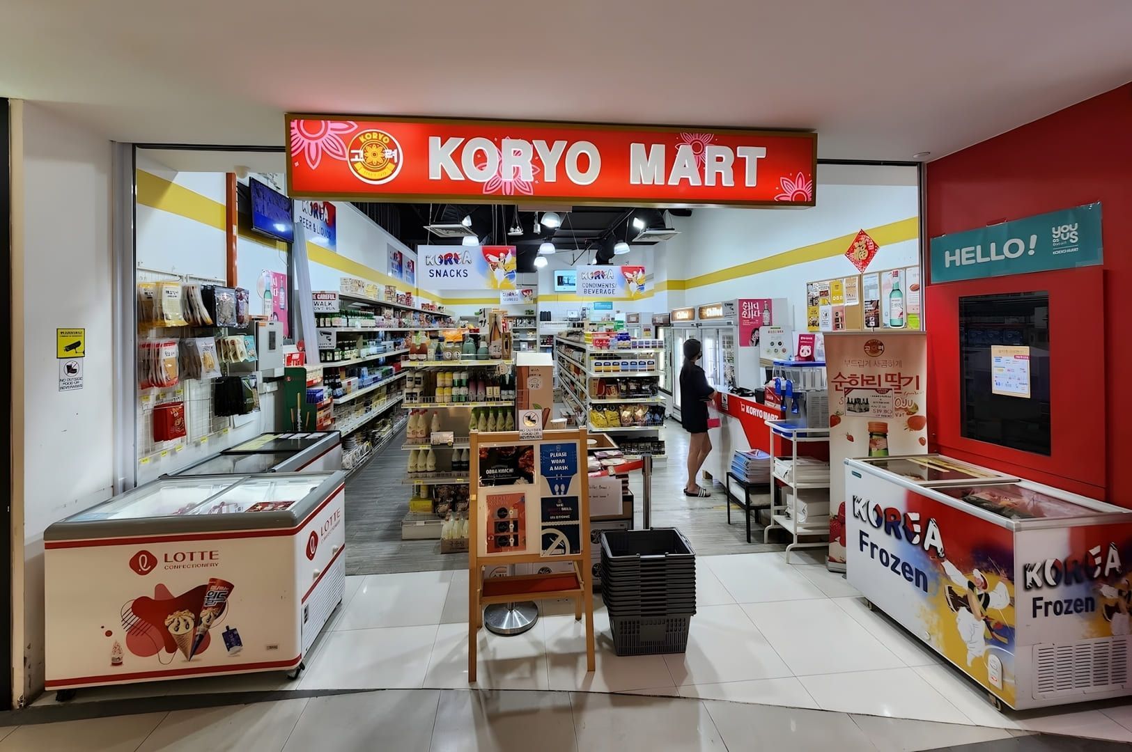 Assorted instant noodles, featuring Korean ramen or Buldak, arranged in transparent plastic containers for easy viewing.
