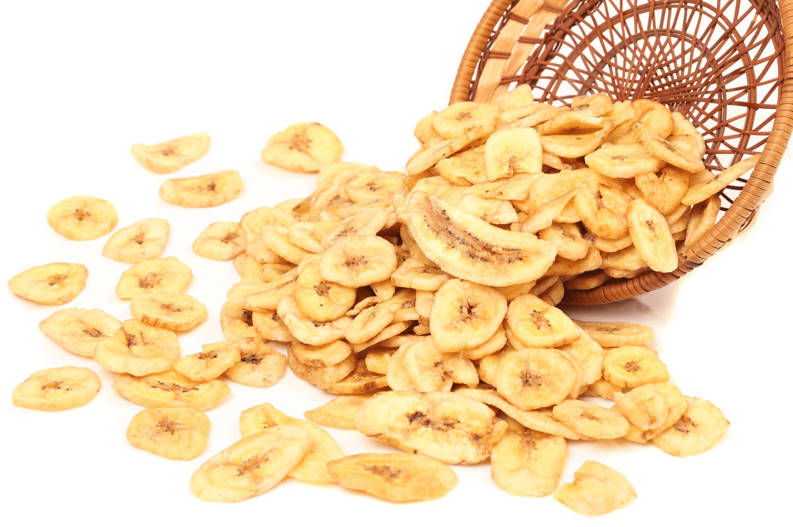 Golden banana chips spill from a woven basket onto a white surface, their crisp texture and sunlit hue evoking the warmth of tropical snacking. Though visually distinct from ramen, the image offers a sensory counterpoint—highlighting how frying transforms ingredients like garlic or banana into craveable, aromatic bites.