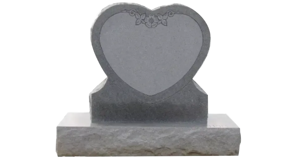 A gravestone in the shape of a heart on a white background
