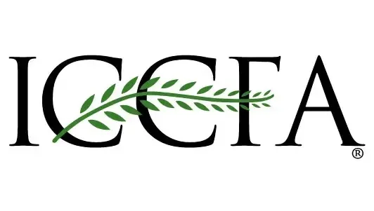 A logo for iccsa with a green branch in the middle.