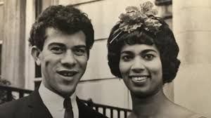 Bert and Shirley stood outside the registrars office