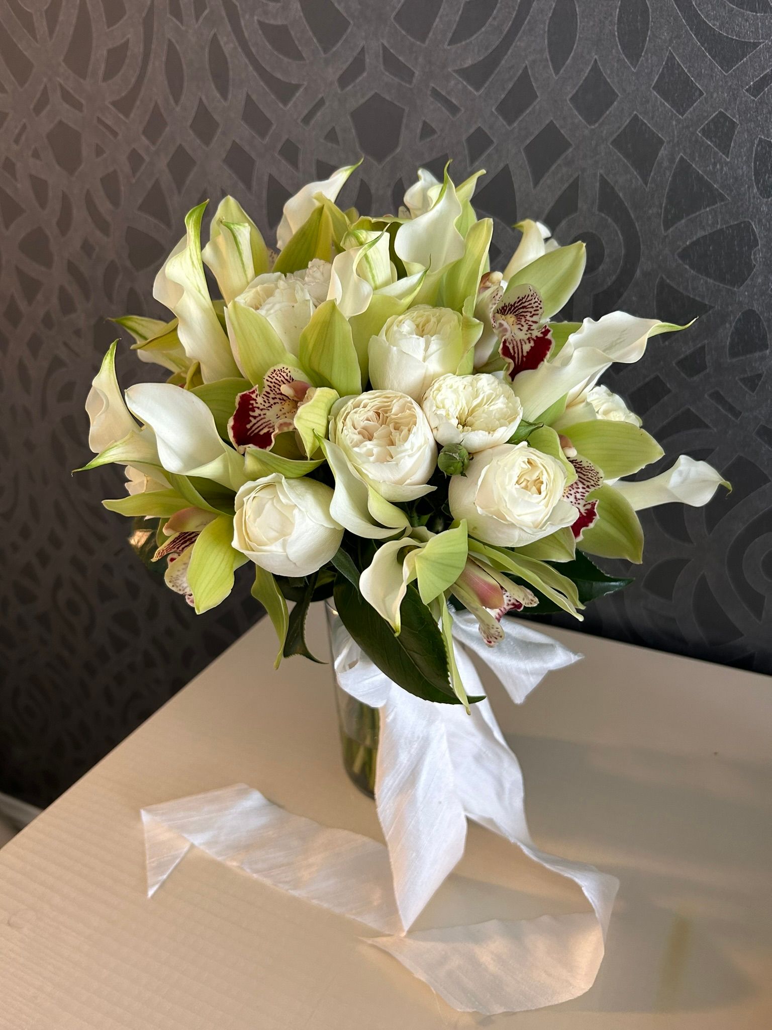 Modern bridal bouquet with orchids