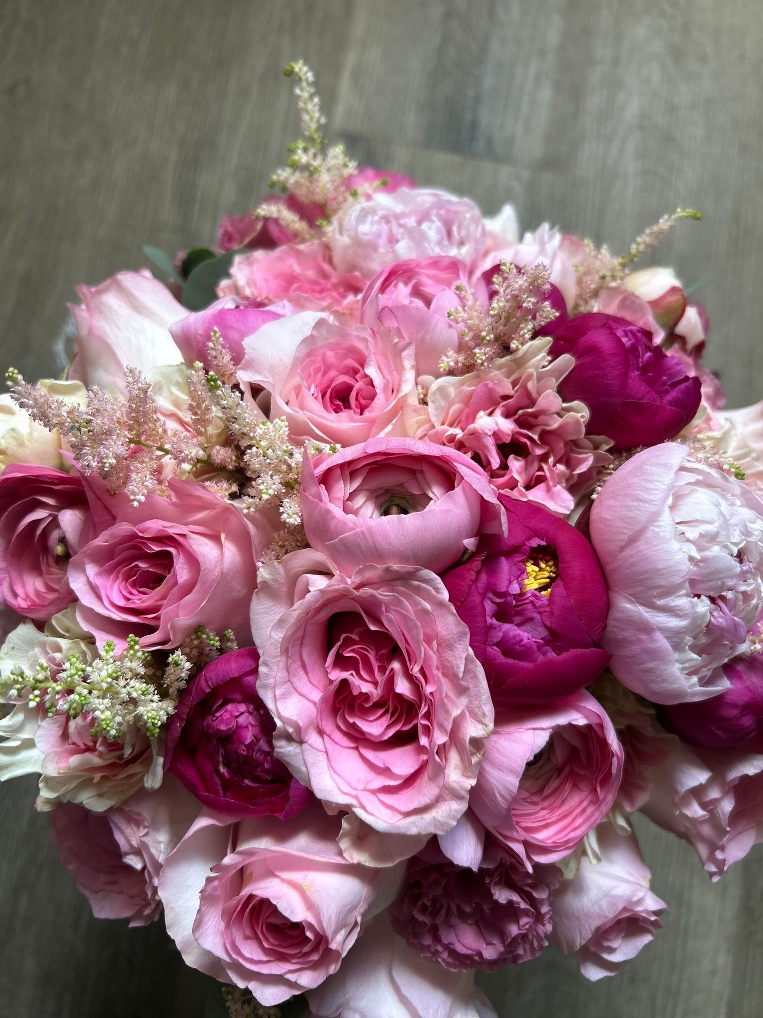 Fuchsia bridal bouquet with peonies