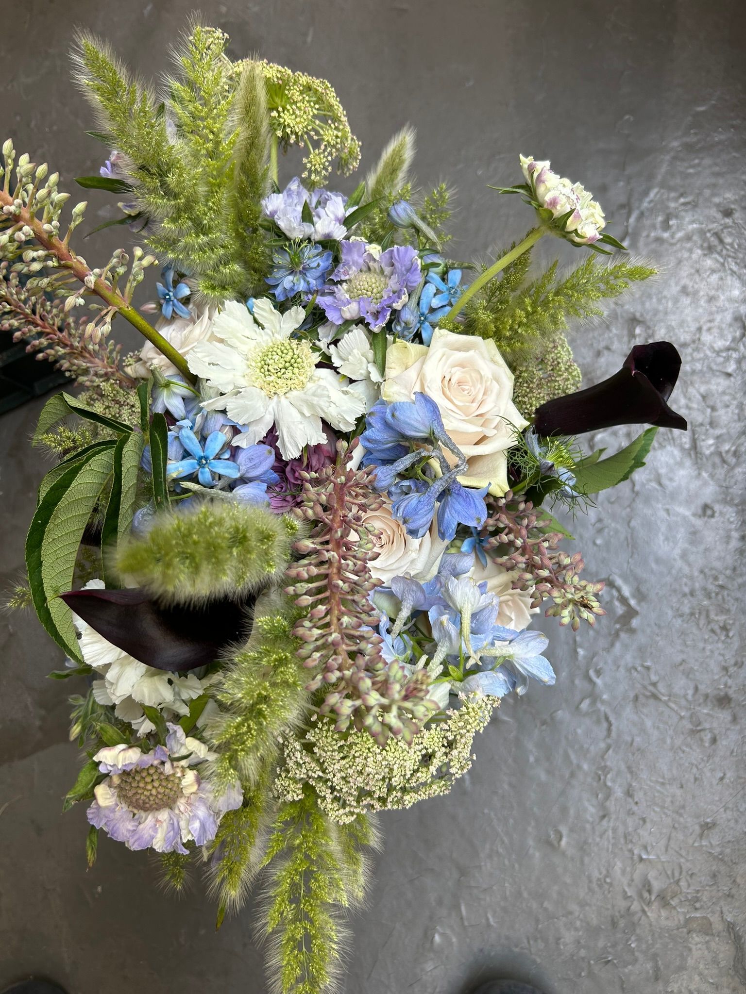 Wildflowers bridal bouquet with grasses and california natives