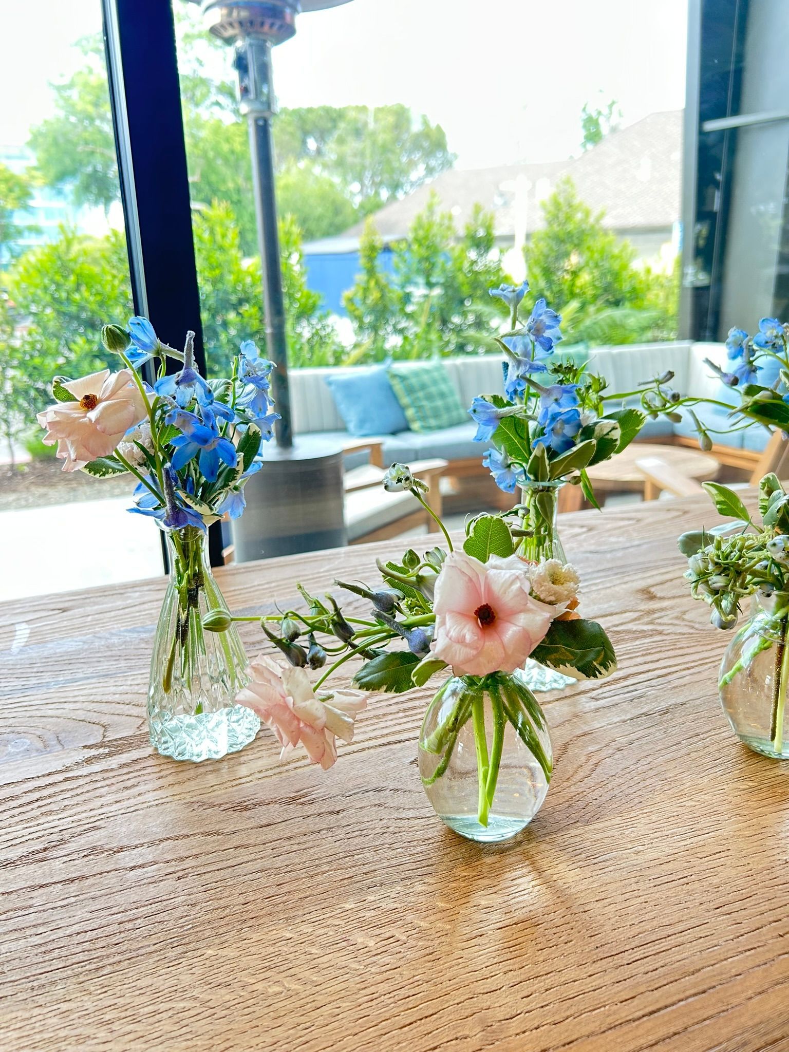 Bud vases with delicate spring flowers