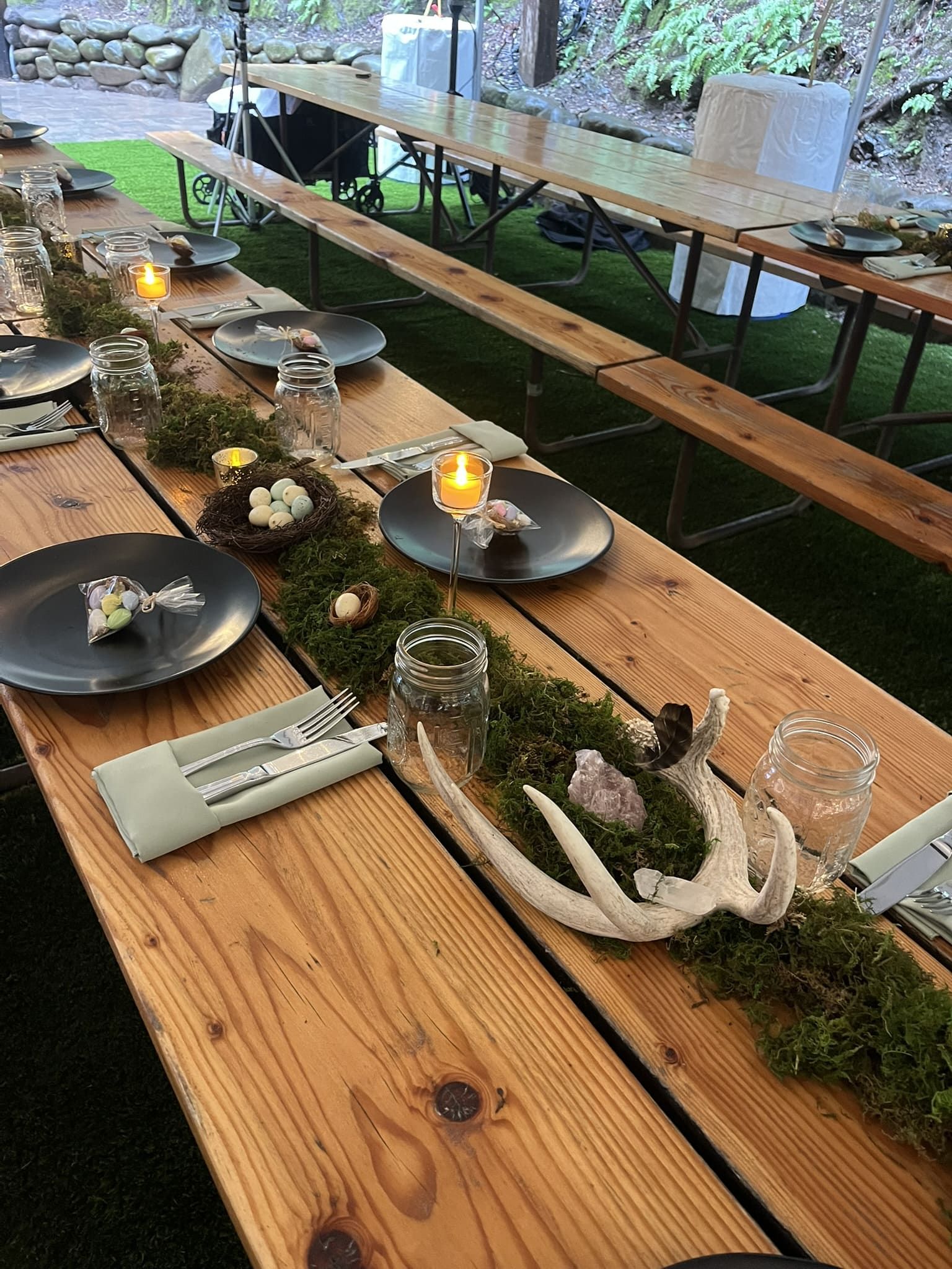 Table decor with moss antlers and candles
