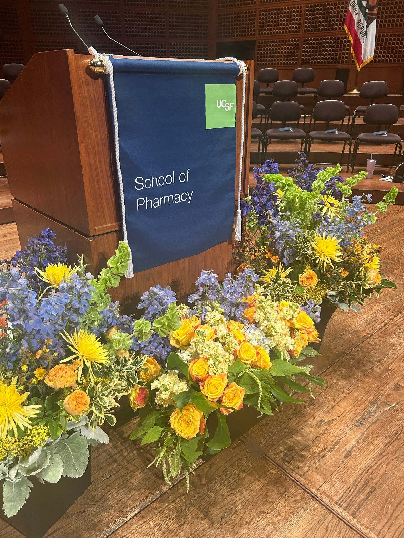 Stage decor, flowers for ceremonies, conferences and performances, displays designed by Red Bud Florals