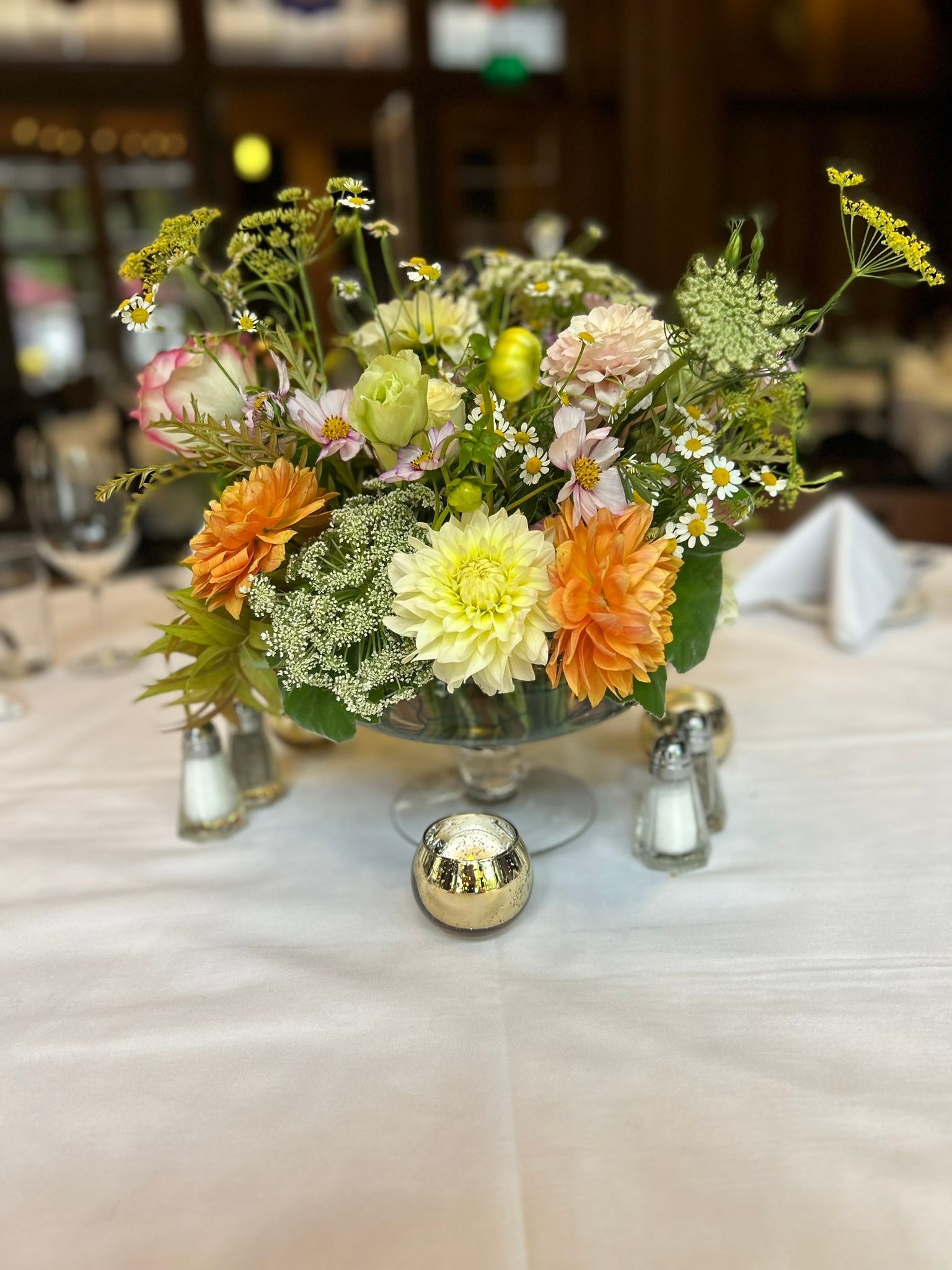 Centerpiece with bright colors flowers