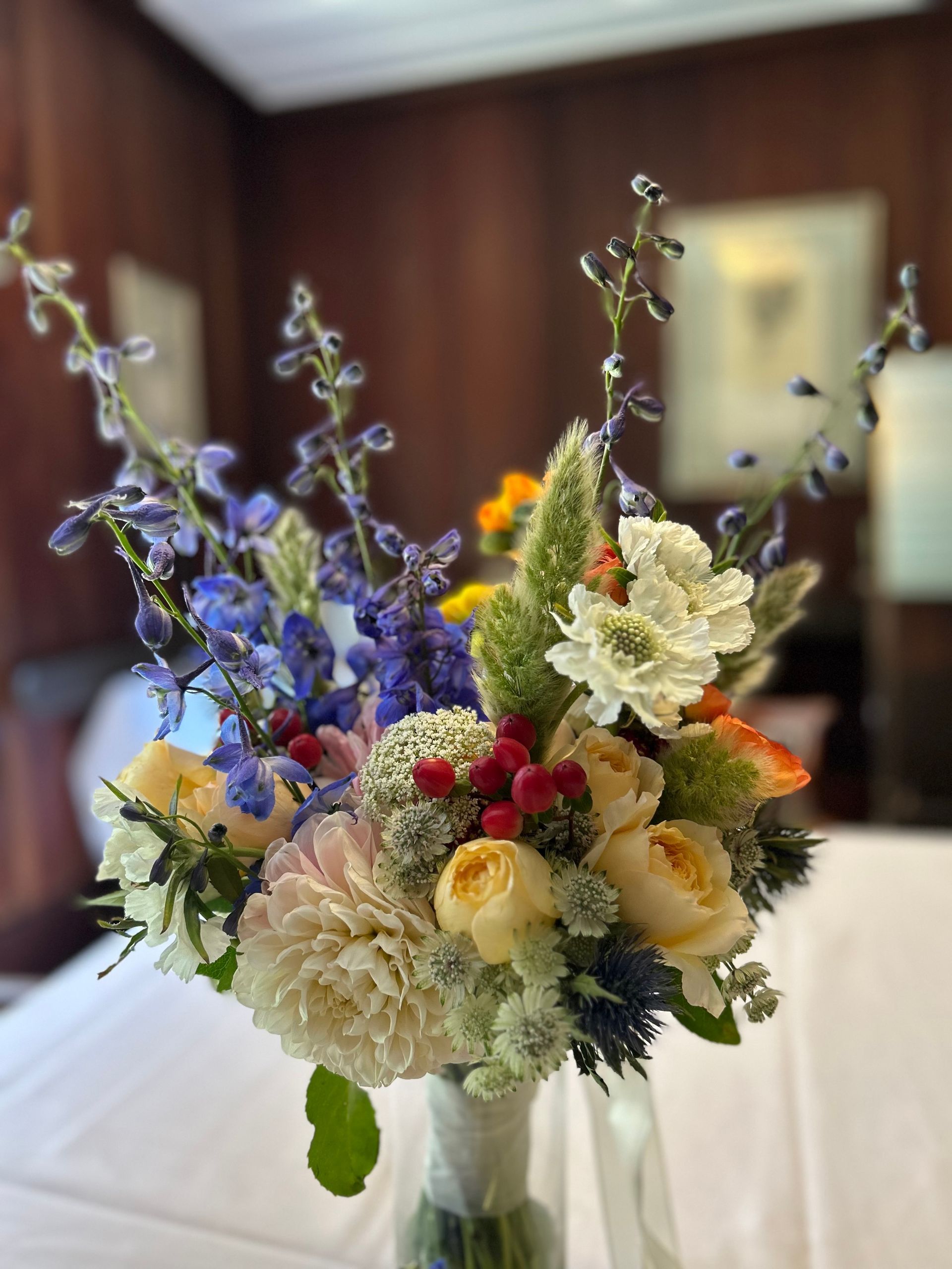 Handheld bridal bouquet in bright colors
