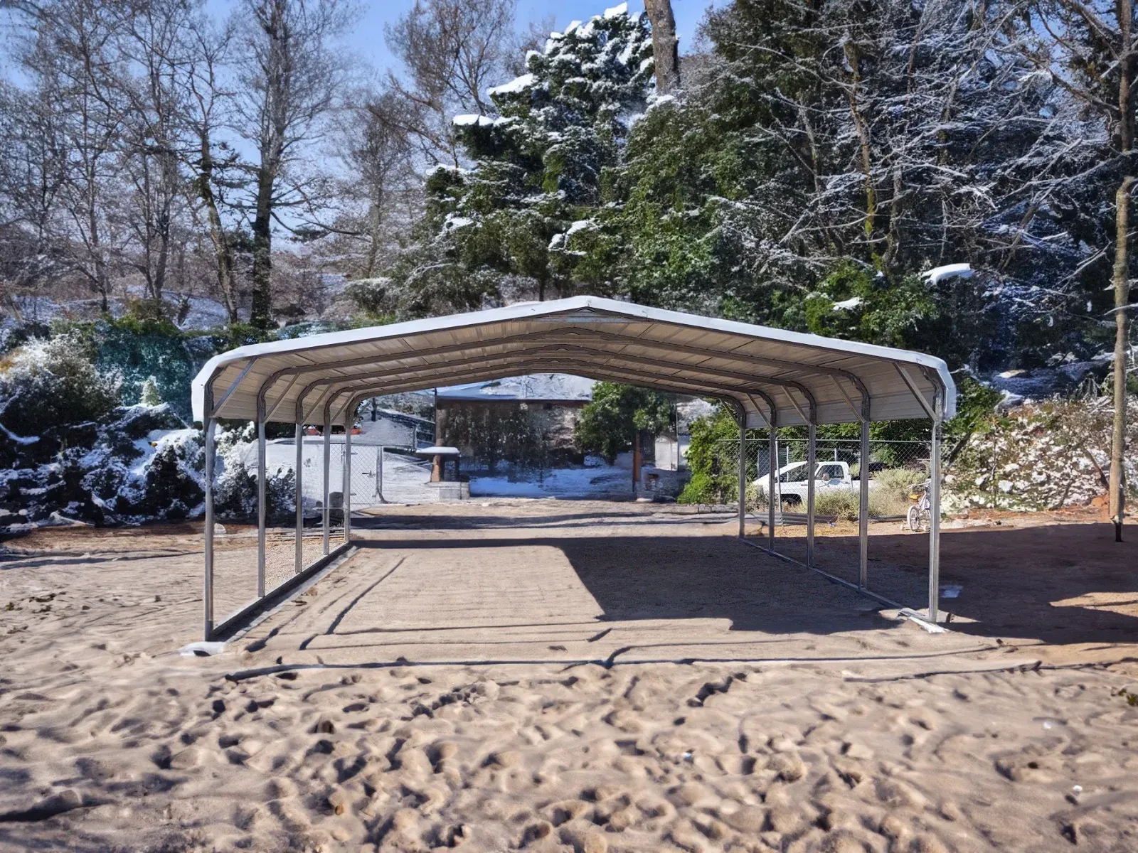 a carport is sitting in the middle of a field