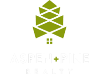A green pine cone with a house in the background is a logo for a real estate company.