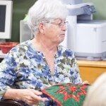 Woman in Floral Shirt — Authorized Dealer in Pensacola FL