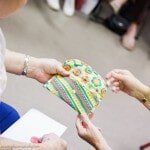 Woman Receving Gift — Authorized Dealer in Pensacola FL