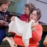 Woman Holding White Fabric — Authorized Dealer in Pensacola FL