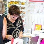 Woman Checking the Fabric — Authorized Dealer in Pensacola FL