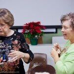 Woman talking — Authorized Dealer in Pensacola FL