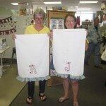 Two Woman Holding their Craft — Authorized Dealer in Pensacola FL