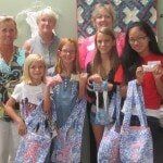 Young Girls Holding Bags — Authorized Dealer in Pensacola FL