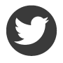 A white bird is in a black circle.