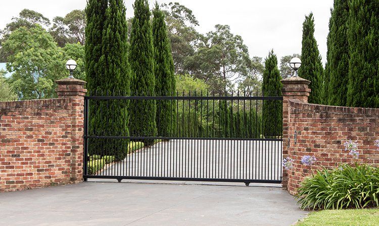 Driveway Entrance Gate in Brick Fence — Rohnert Park, CA — Northgates Motion
