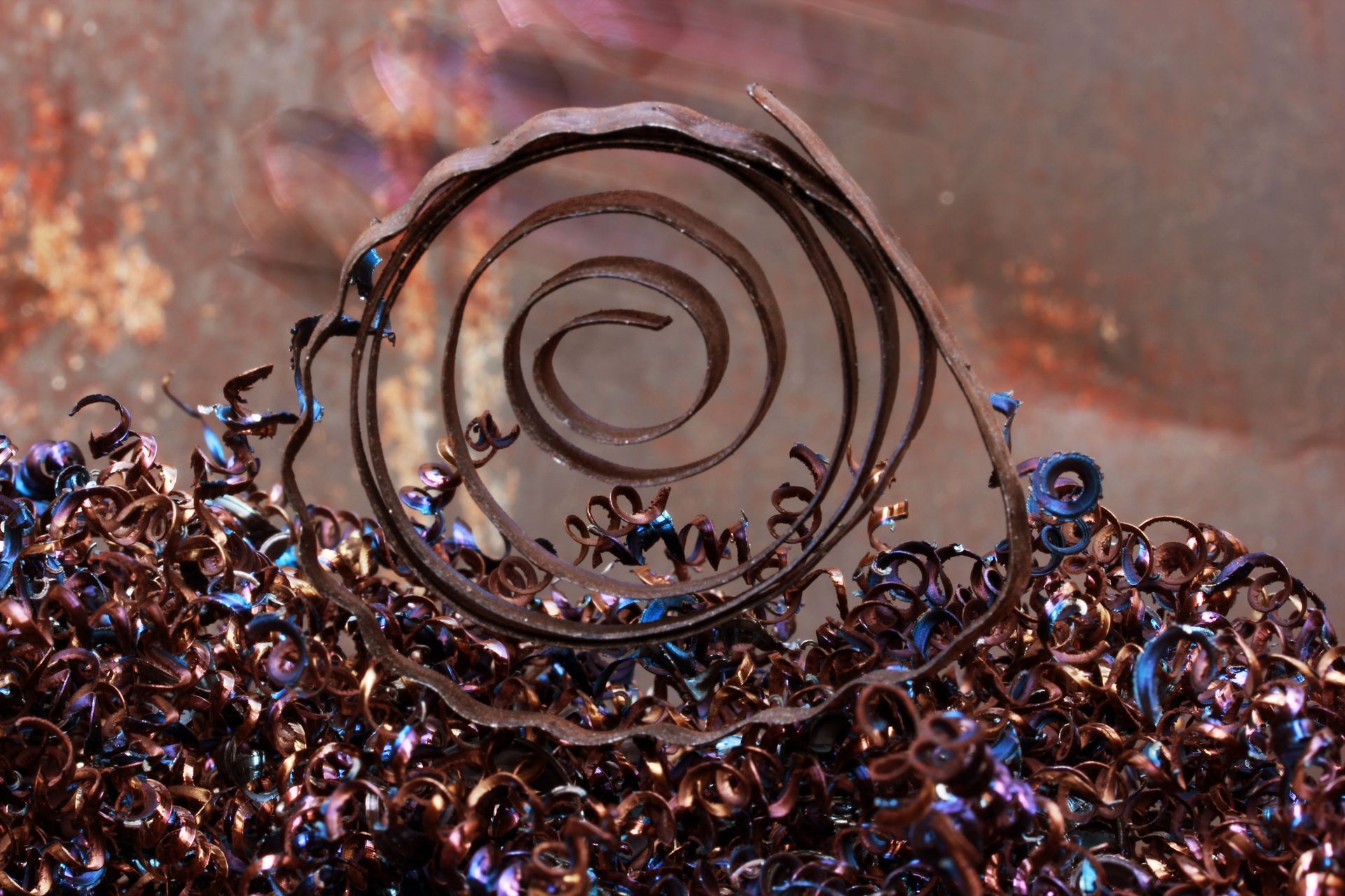 A pile of metal shavings with a spiral in the middle