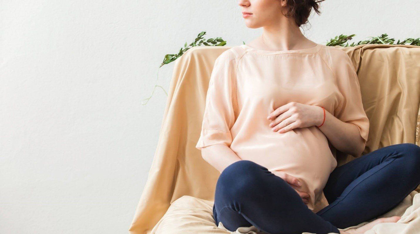 Pregnant Woman Sitting - San Antonio, TX - Adoption Angels Pregnant Woman Sitting - San Antonio, TX - Adoption Angels