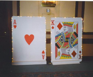 Two playing cards with the ace of hearts and the king of diamonds