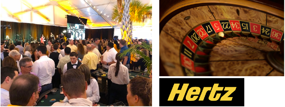 A group of people playing roulette next to a hertz logo