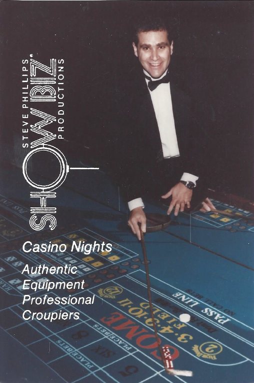 A man in a tuxedo is standing in front of a casino table