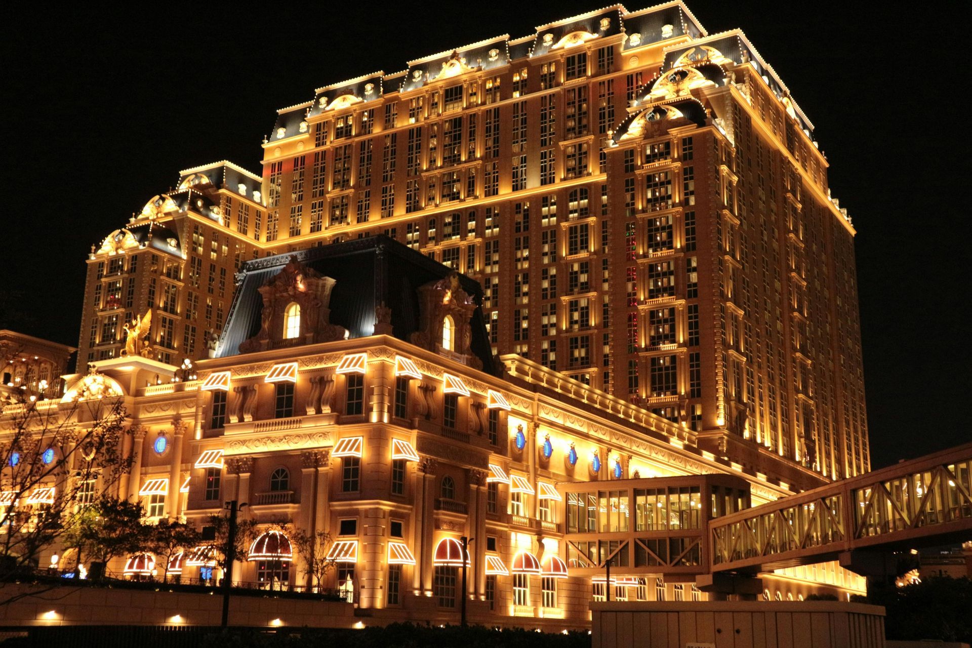 A large building that is lit up at night